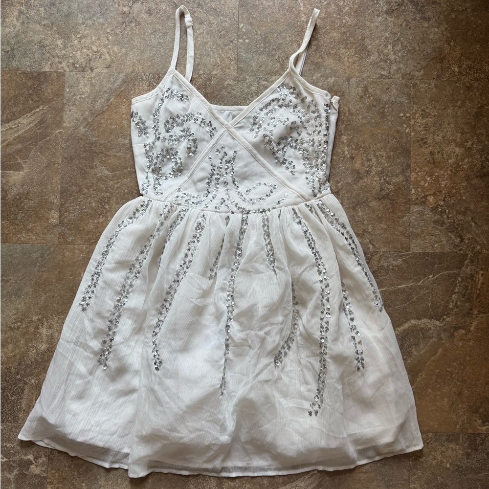 Elegant White Dress with Silver Accents